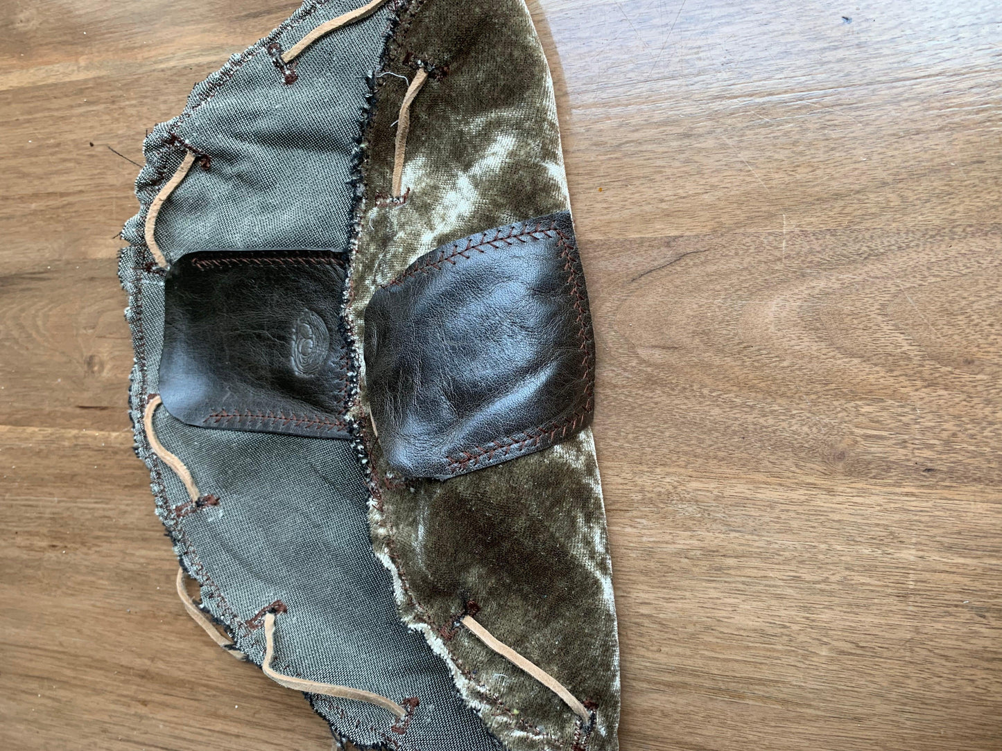 This Herbal pouch is designed to discreetly store all of your herb tools for a sleek and organized solution that is perfect for discerning clients. Made with high-quality designer fabrics and premium leathers, this portable and stylish nest features a circular shape and a leather landing pad for convenience. It also includes convenient pockets for storage.
