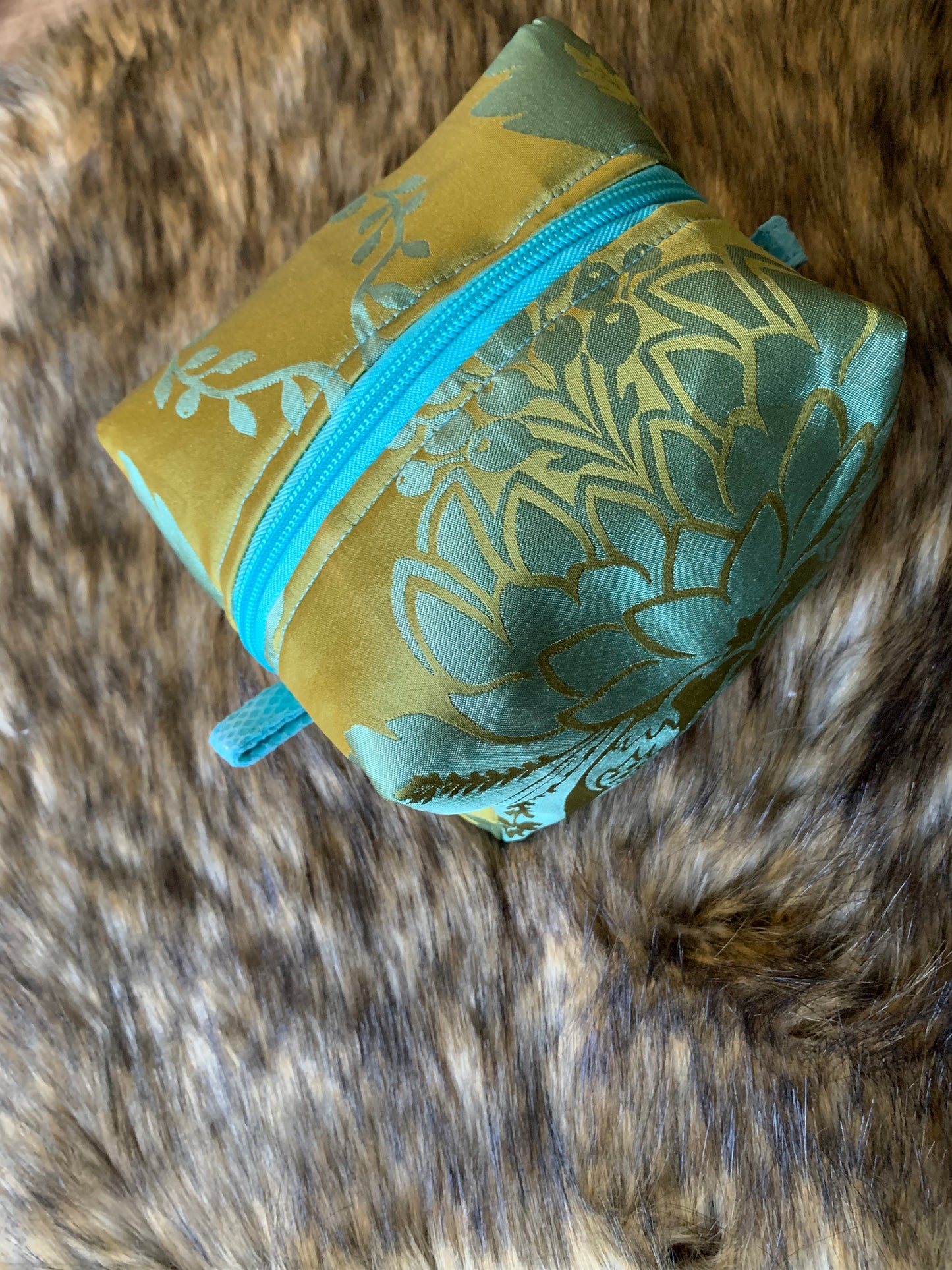 Nesting Essentials makeup bag-cosmetic toiletry organizer. Olive and turquoise Stylized Silk Artichoke design.