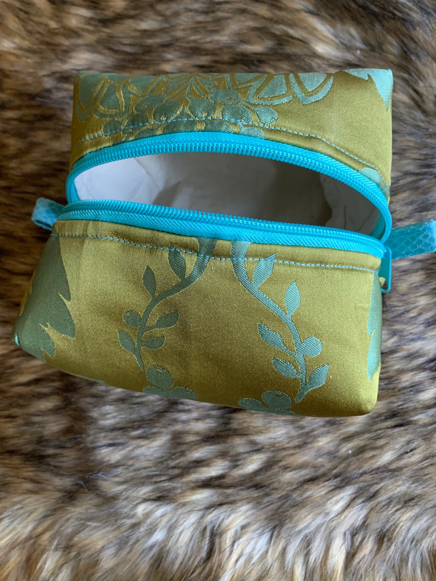 Nesting Essentials makeup bag-cosmetic toiletry organizer. Olive and turquoise Stylized Silk Artichoke design.