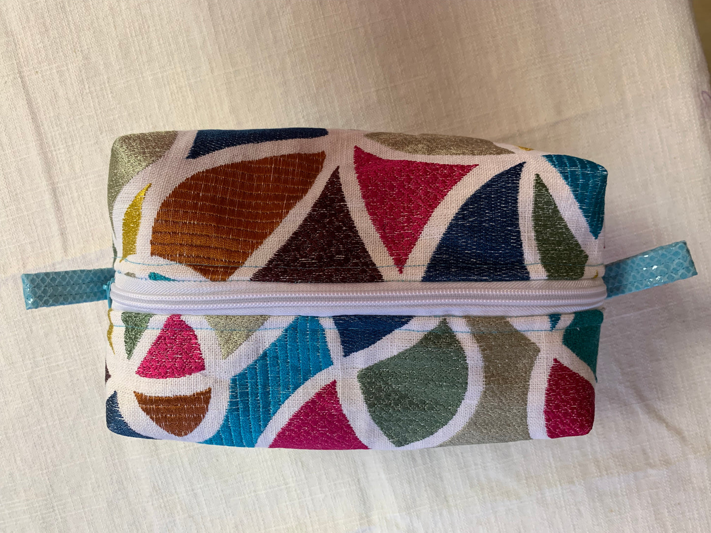 Nesting Essentials toiletry and make up bag. Stunning Jewelled geometric fabric.