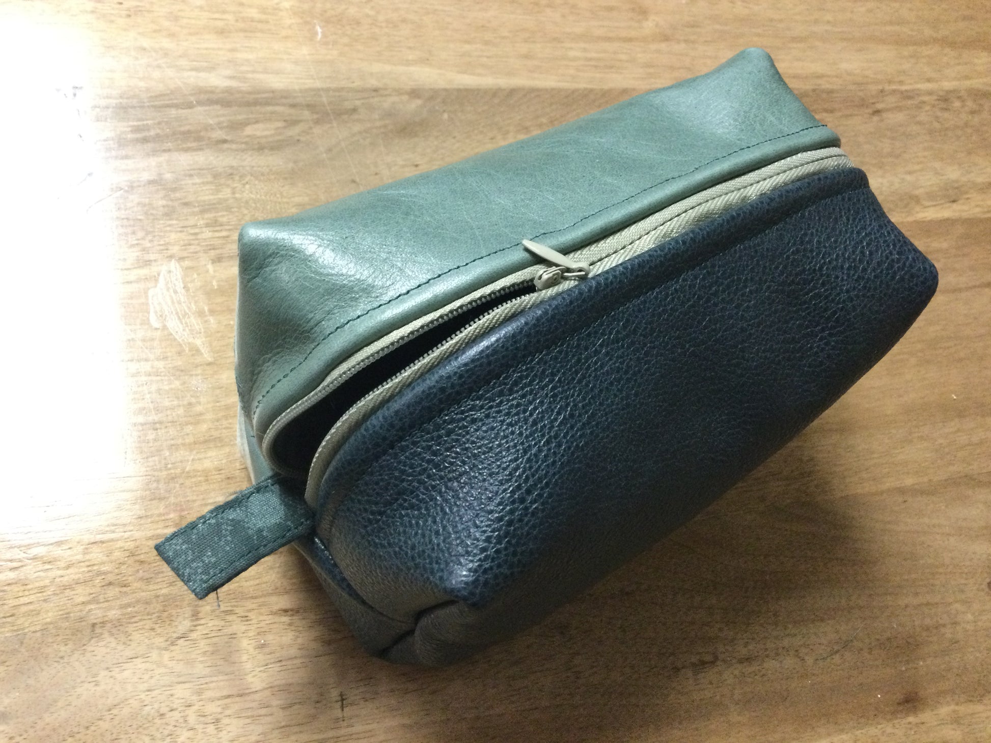 Nest all of your precious essentials together with elegance. Ocean top grain leather drop kit holds all of your toiletry's, as unique as each day. Each Nesting Essentials is fully lined and padded with unbleached 100% cotton. Make caring for your personal self a glamorous affair.