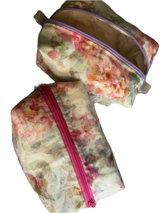 Nest all of your precious essentials together with elegance. This is a elegant antique floral linen, pinks and lavender, embracing the renaissance tones celebrating each day. Pink or lavender zipper and soft leather thumb handles make use a breeze. Each Nesting Essentials is fully lined and padded with unbleached 100% cotton. Hand wash as needed. Make caring for your personal self a glamorous affair.
