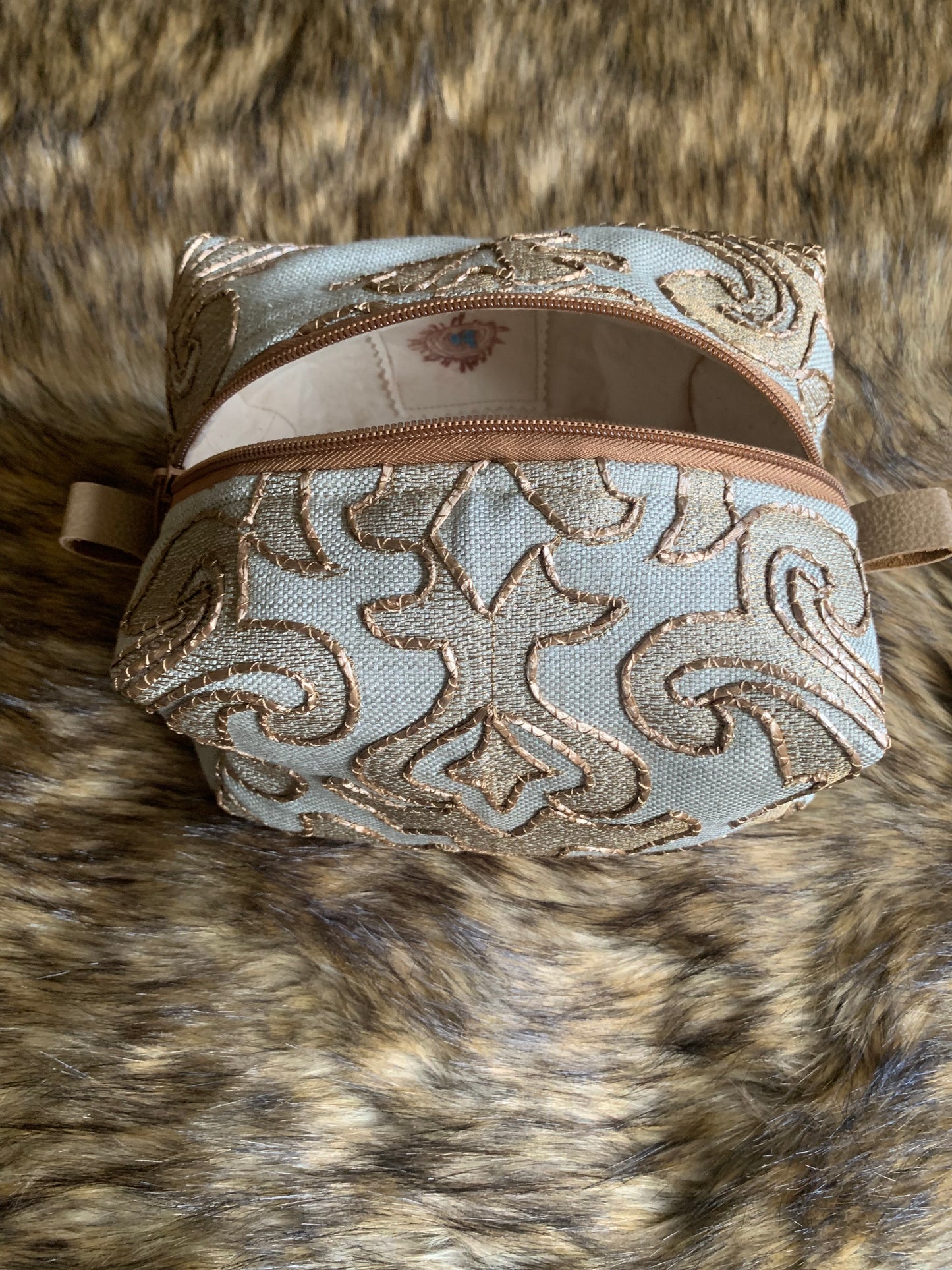 travel cosmetic bag soft pastel teal linen bronze embroidery reminiscent of Cezanne. Fully lined with 100% cotton. 